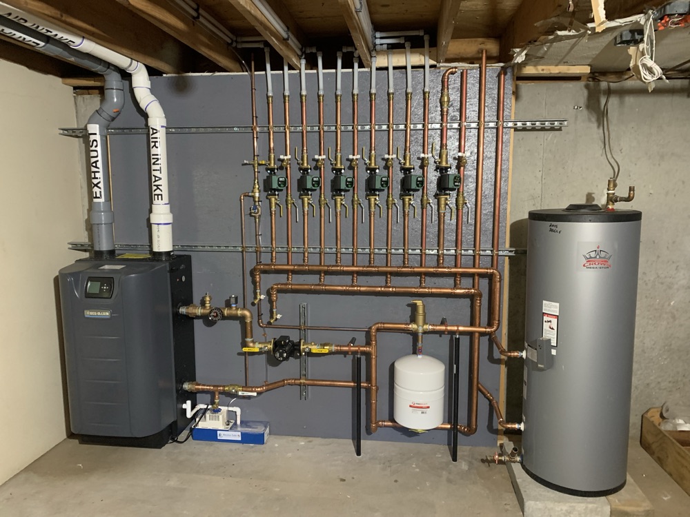 High-efficiency boiler, copper manifold, and indirect water heater installed by TruServ