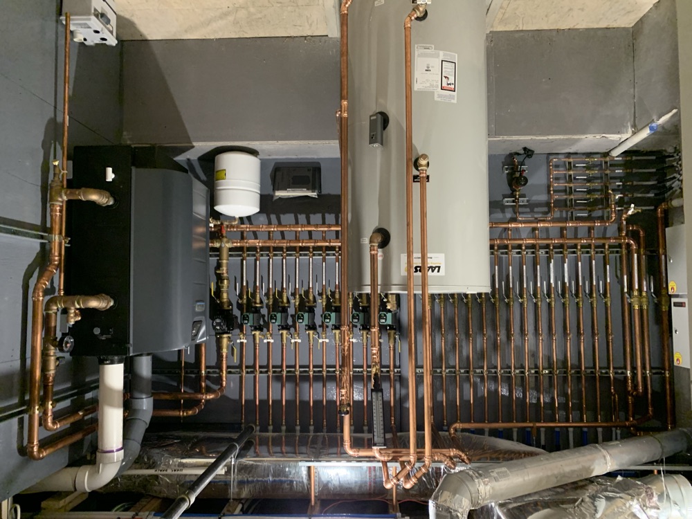 Mechanical room with boiler, indirect tank, and radiant distribution